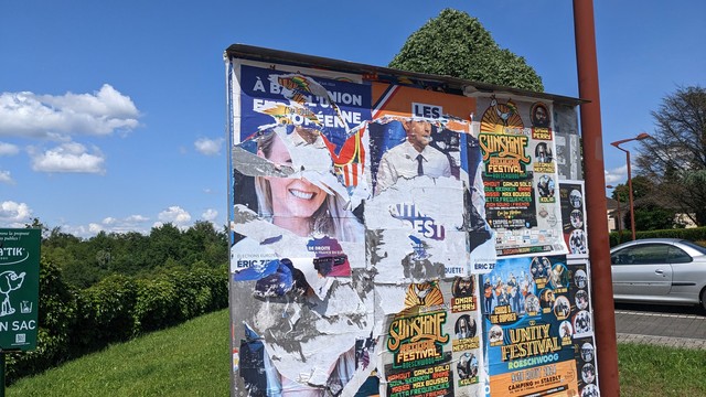 Leftovers of election posters on the town's blackboard.